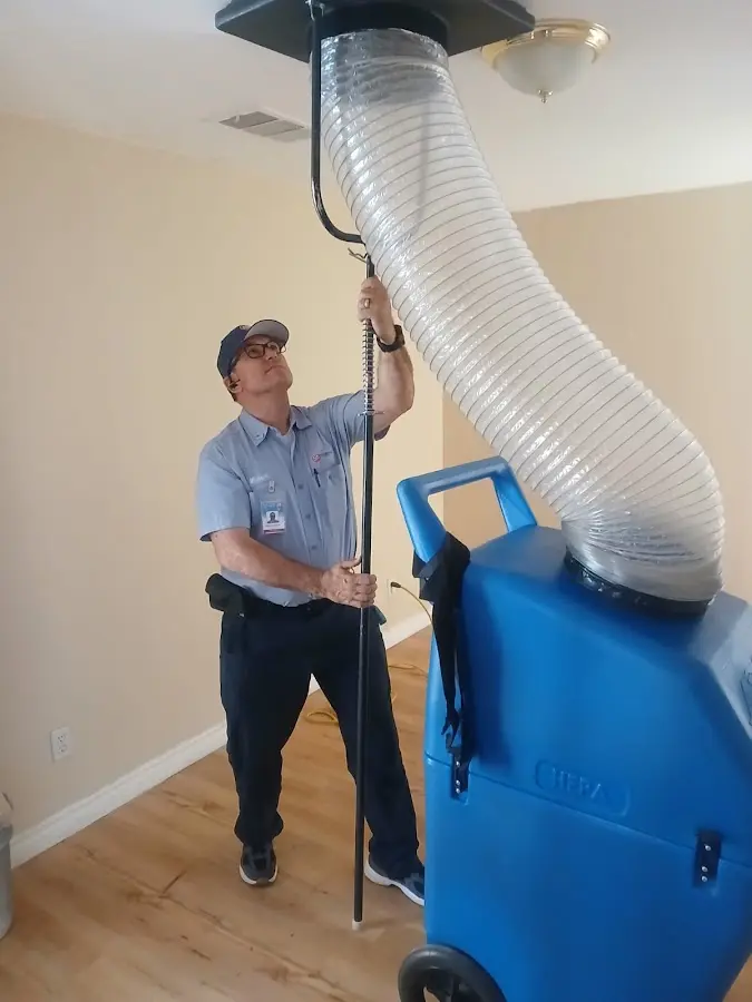 HVAC Installation technician using HEPA equipment in Buda